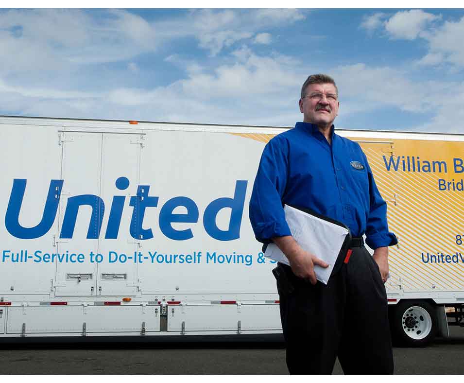 Move estimator in front of United Van Lines Truck
